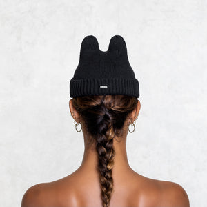Cotton Elastic Black Bunny fisherman style Beanie on a woman facing back from the shoulders up