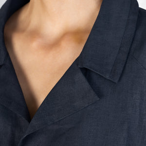 The details of the collar of a linen Indigo suit jacket