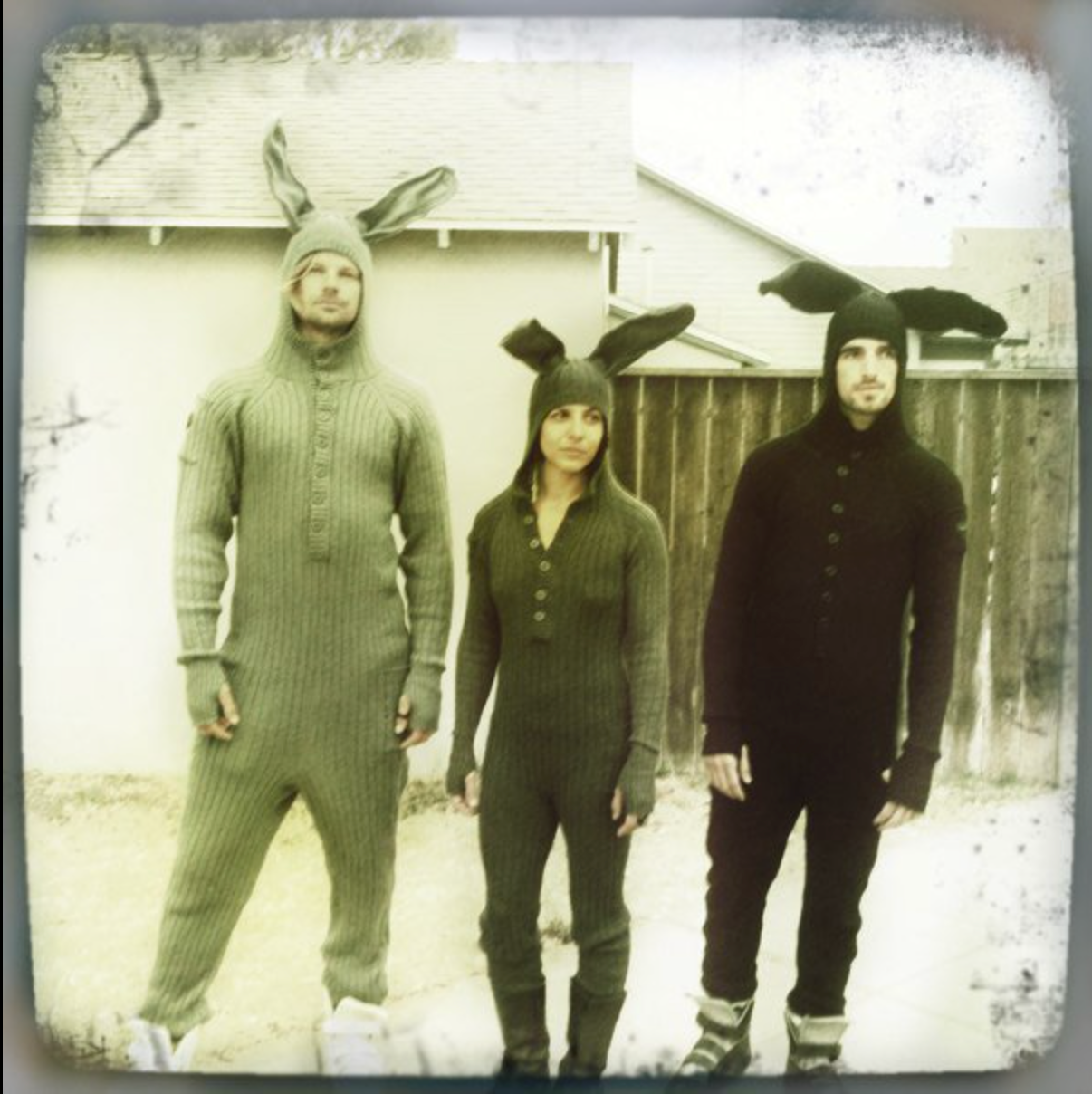 3 people in Blamo Bunny Onesies