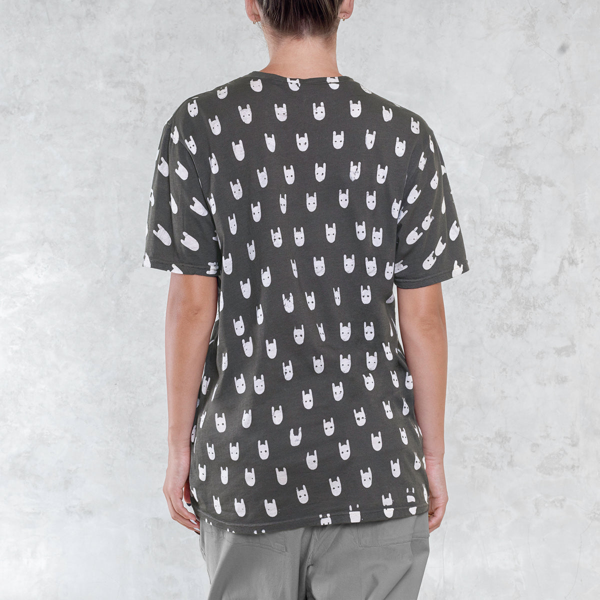 Woman from waist to chin wearing a batik cotton shirt