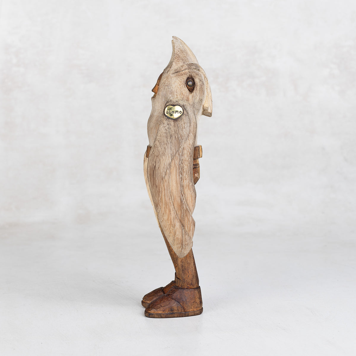 Wooden bird-shaped figurine with a visible BLAMO logo on a white background