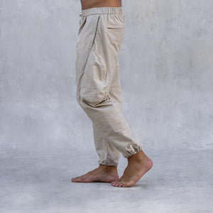 A side view of a cargo style BLAMO pant from the waist down 