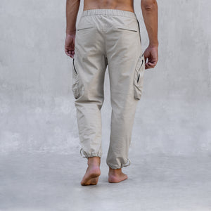 A back view of a cargo style BLAMO pant from the waist down 
