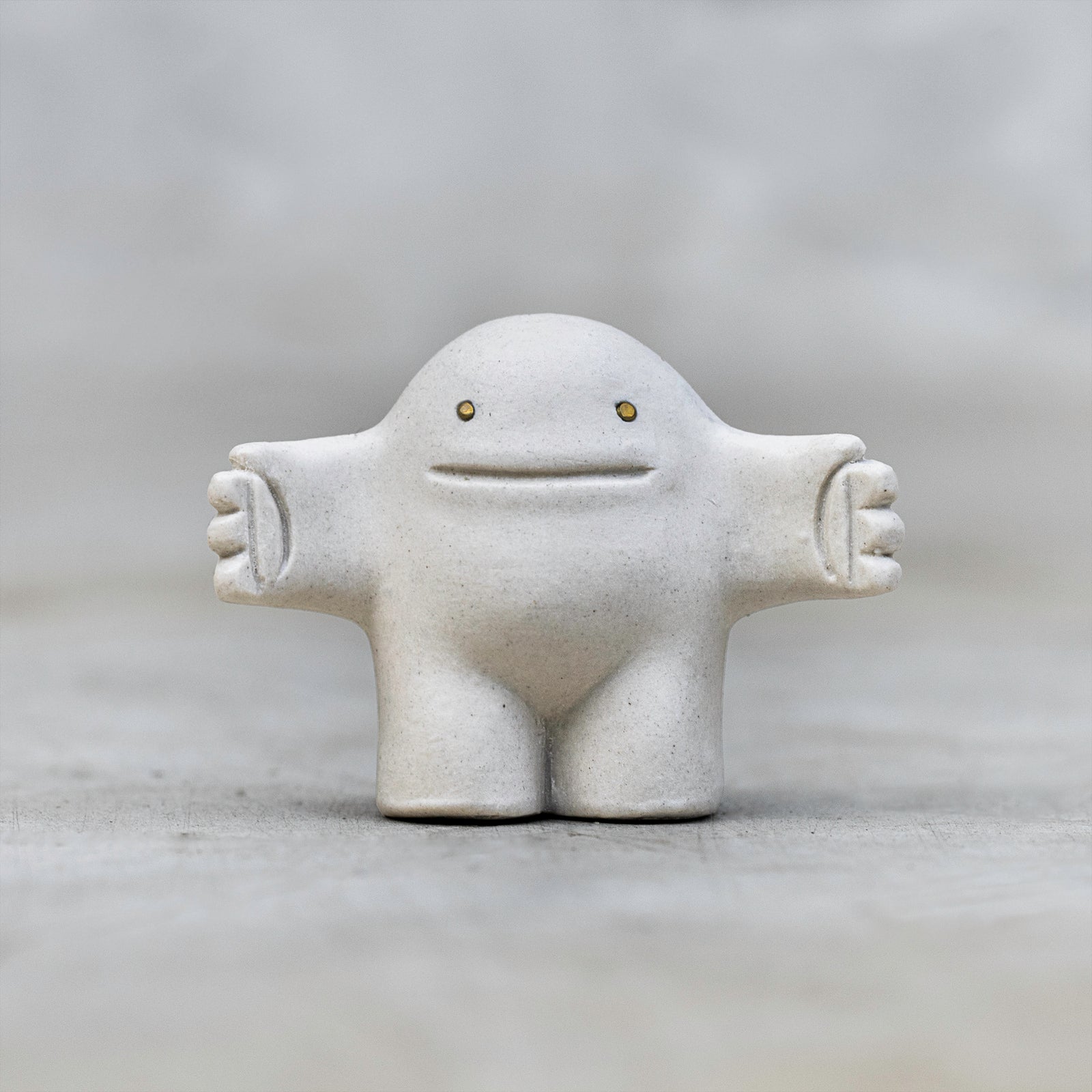 White Ceramic and Brass Art Figurines