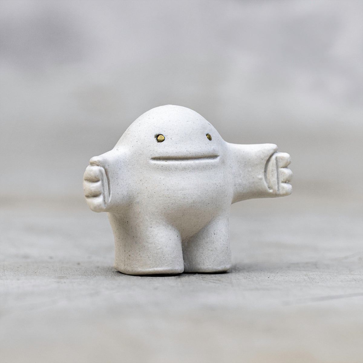 White Ceramic and Brass Art Figurines