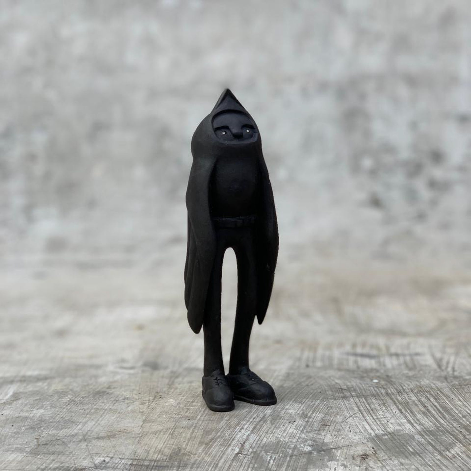 Ceramic black bird sculpture