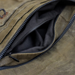 Close up of an internal secret zipper pocket of a fanny pack 