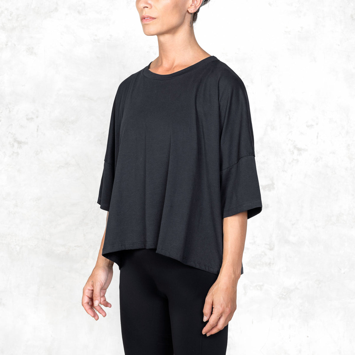 
Quarter view of Katana cropped tee made from ultra-soft Supima cotton with oversized crewneck.