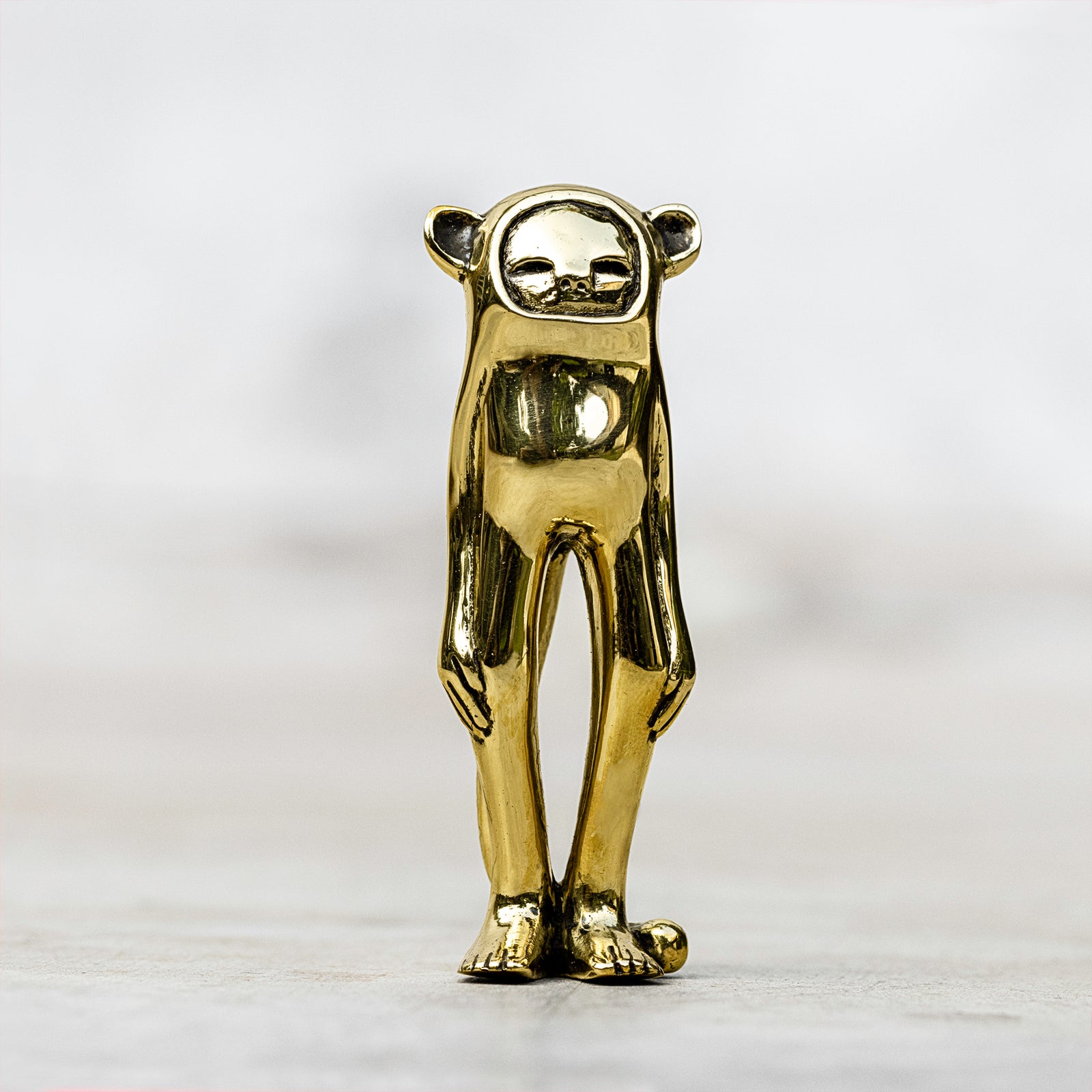small brass monkey charm 