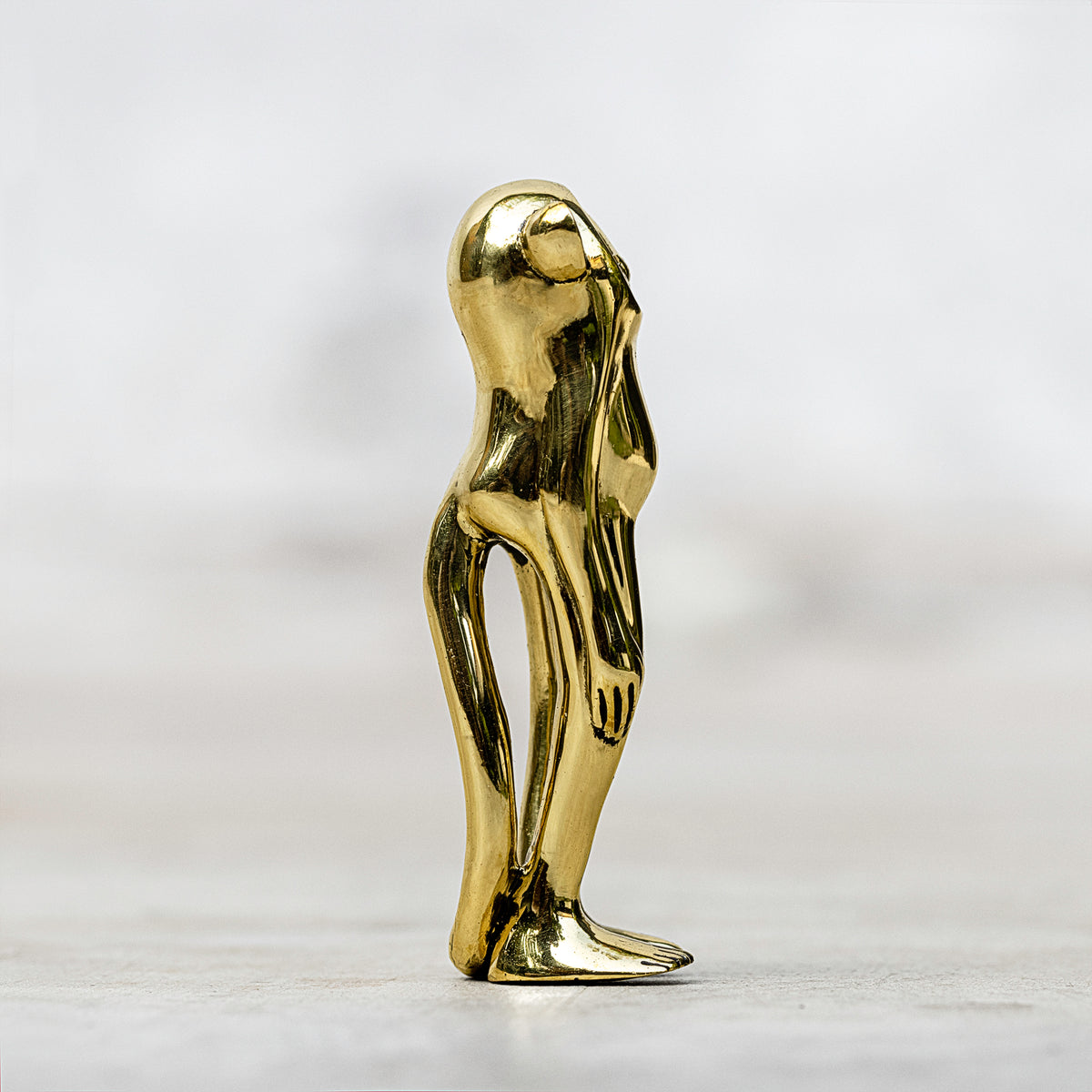 small brass monkey charm 