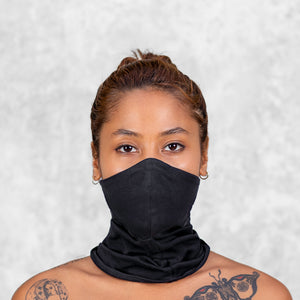 Woman in a Black Buff Style Face Mask