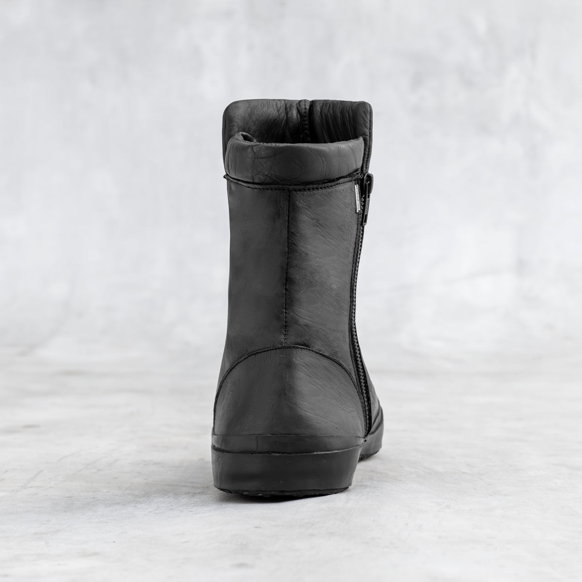 Back of  black Vegetable Tanned Leather Razed Boots