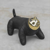 Black Leather and Gold Brass Cat figurine rolling and walking on a gray surface