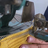 Person making a yellow knit beanie with rounded ears