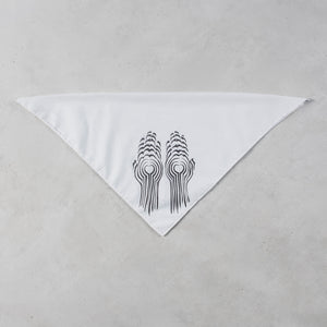 A white triangular bandana featuring a black graphic of two stylized hands holding circular elements, displayed flat on a textured light gray background.