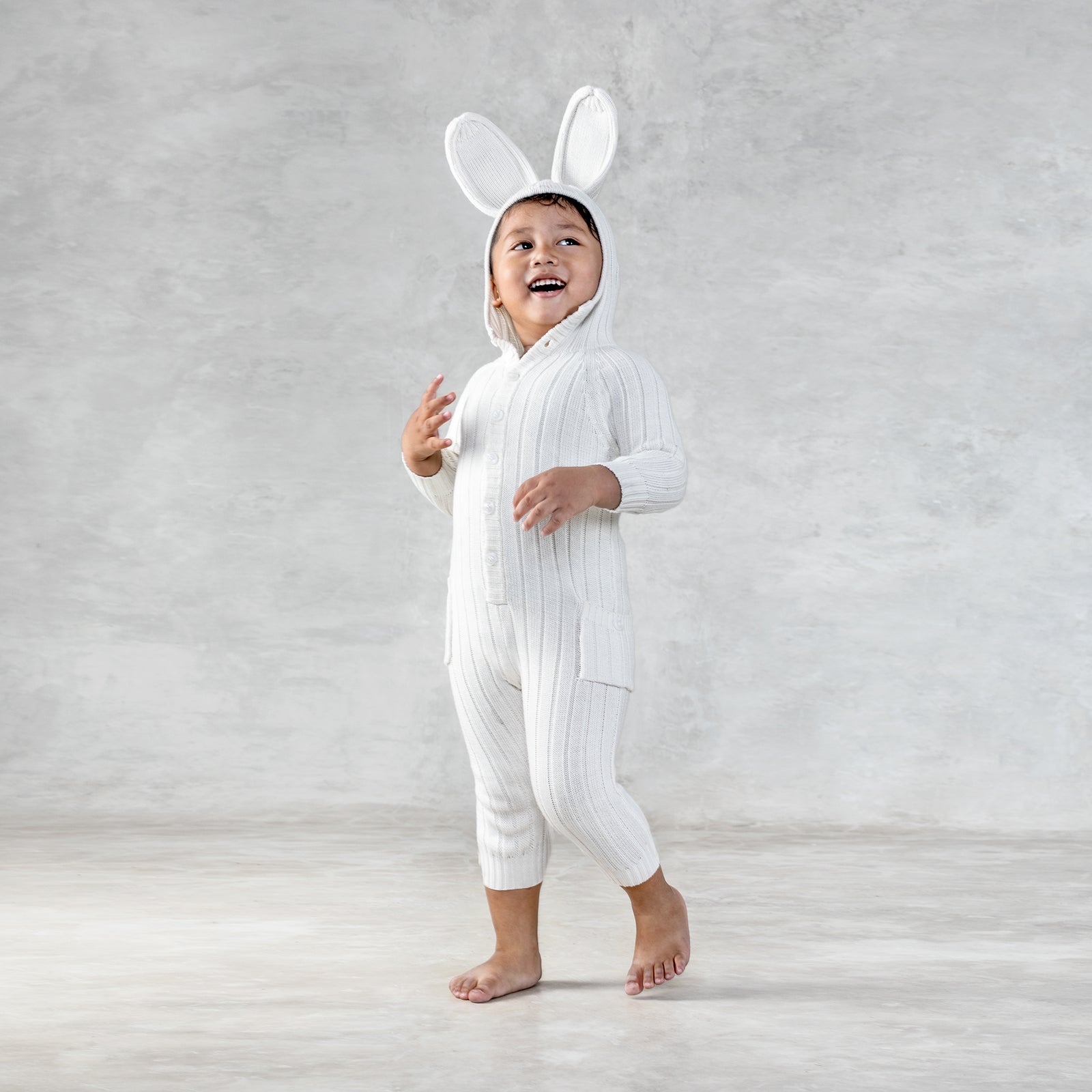 white hooded baby bunny romper