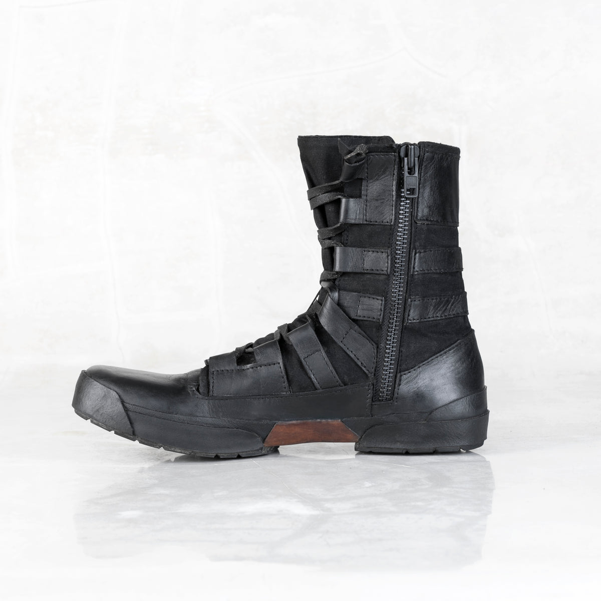 Black leather boots with leather laces