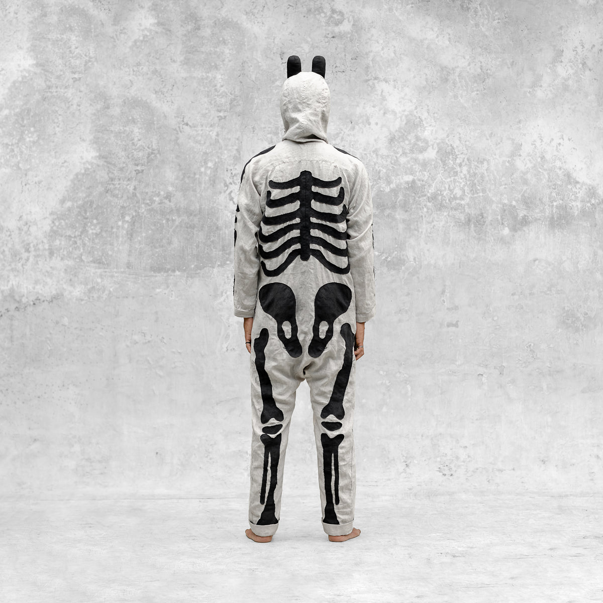 A one piece skeleton appliqué jumsuit