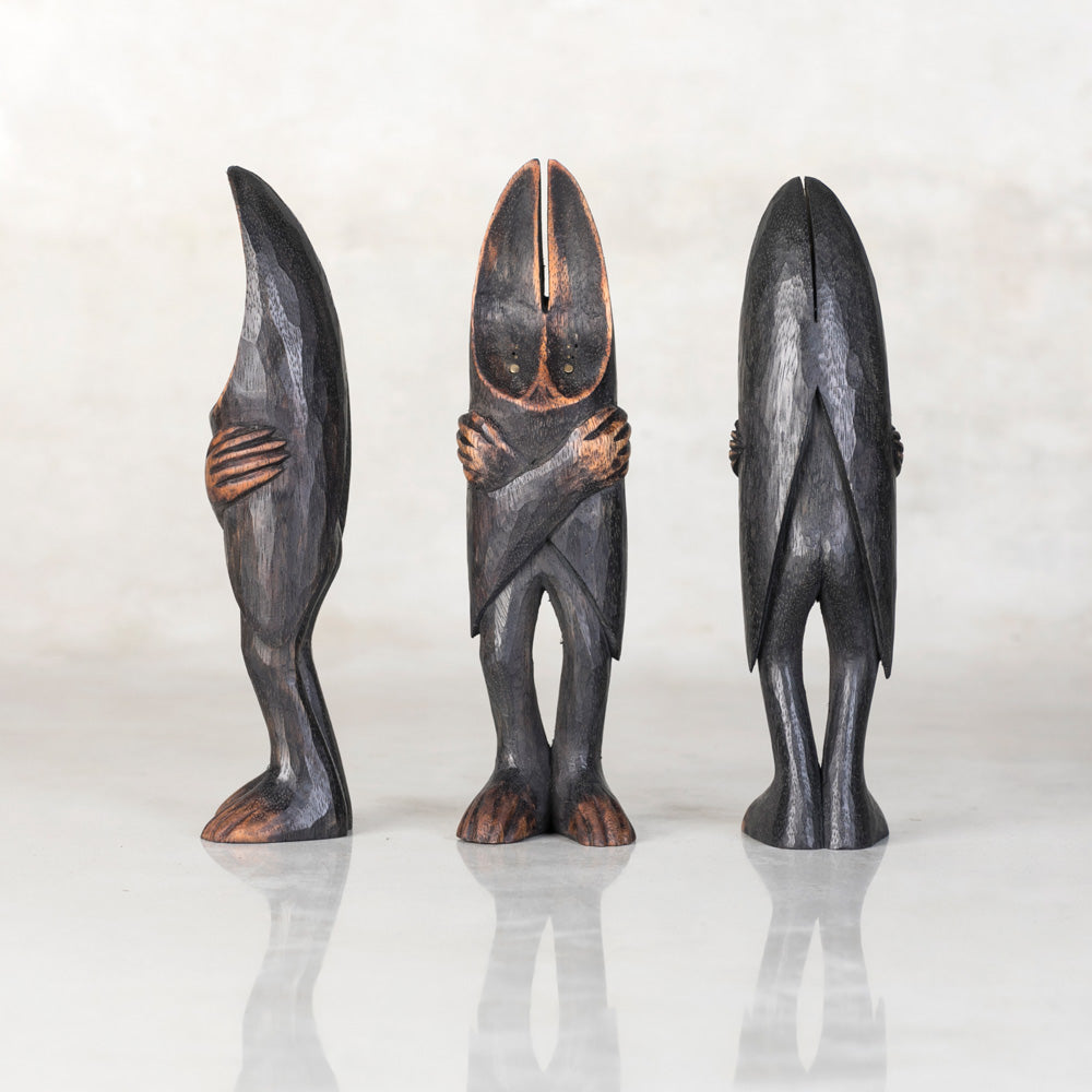 hand carved monkeypod wood bat statues